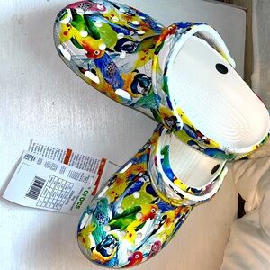 NWT Crocs with bird toucan pattern